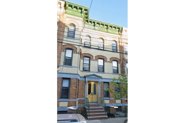 View of property featuring entry steps