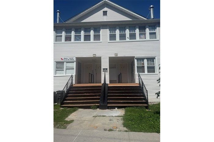 View of front of property featuring a porch
