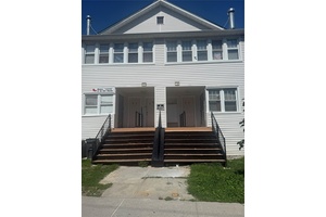 very large property mint condition 4 over 4 bedrooms with 2 full baths in each apartment first floor vacant 2nd floor occupied by tenants