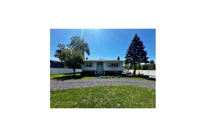 Split foyer home with a chimney