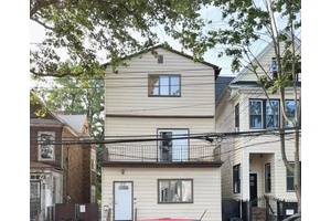 Welcome to this delightful 2 family home in Woodhaven.