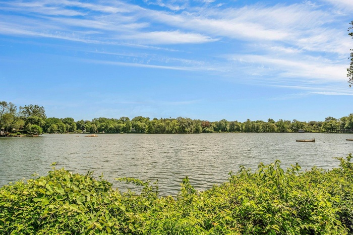 Water view featuring a heavily wooded area