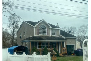 This Colonial Style Home Features 3 Bedrooms, 2.