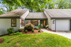 Beautifully renovated condo with TWO decks in secluded setting backing up to green space, in the sought after Heritage Hills community.
