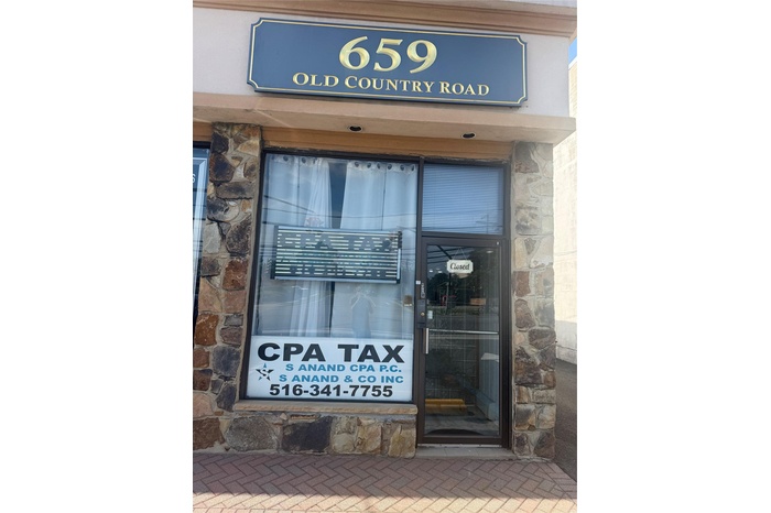 Property entrance with stone siding