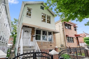 Legal 2 family 2nd fl 2bdrm apt is well lit and boasts of recently designed open concept w wood floors throughout, high ceilings amp ; recessed lighting.