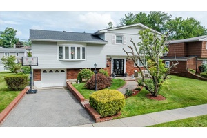 Welcome to 54 Maria Lane, an inviting split level home located in the desirable Yonkers Heights neighborhood, just a stone's throw from the Crestwood train station and Scarsdale Road.