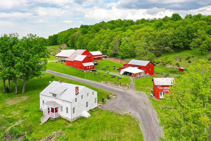 View from above of property with a forest
