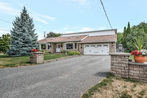 Fabulous Executive sprawling 4 bedroom, 3 bathroom stone bungalow that has a style and quality that is rarely seen anymore.