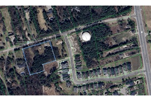 A potential development opportunity for investors seeking land in the prestigious Aurora Estates.