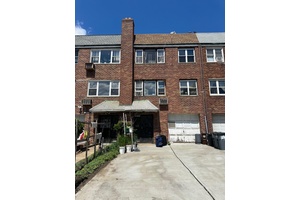 Conveniently located 2 family home in Flushing.