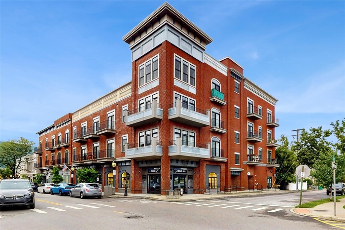 Front View Of Condo Building On Main Street