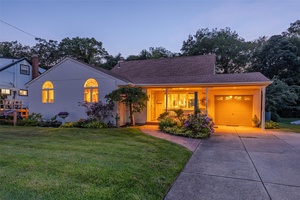 Nestled In The Heart Of Massapequa Park, This Charming Expanded Cape Offers A Perfect Blend Of Comfort And Style.