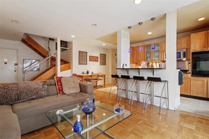 Welcome to an exceptional opportunity at 3850 Hudson Manor Terrace, located in the charming Riverdale neighborhood !