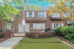 Welcome to this charming single family attached brick home in the heart of Sheepshead Bay.