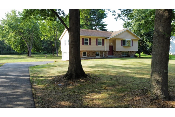 Lovingly maintained Raised Ranch