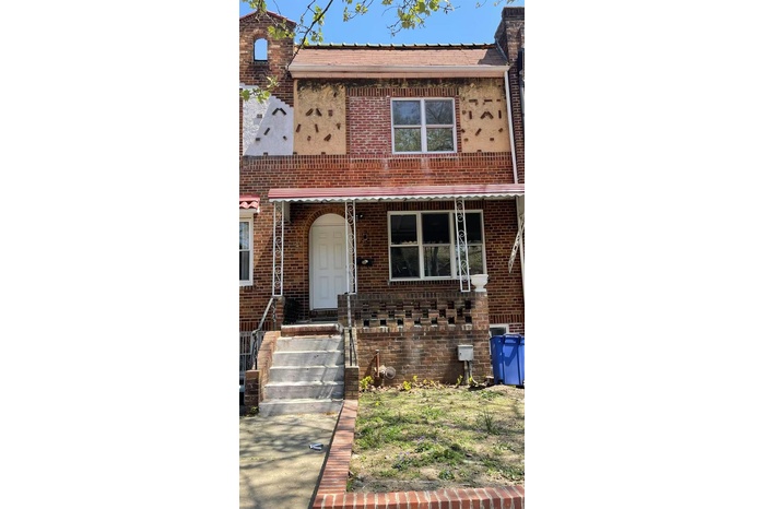 View of front facade with brick siding