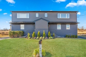 Welcome to this unique waterfront duplex style legal two family home in South Seaford.