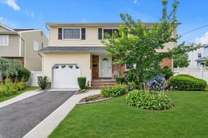 When the temperatures soar, step into this cool and comfortable four bedroom, two and a half bath Side Hall Colonial.