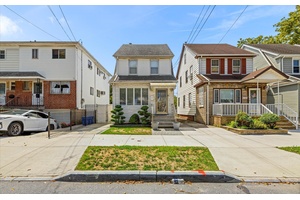 Welcome to 96 36 149th Avenue a true gem nestled in the heart of Ozone Park on an oversized lot !
