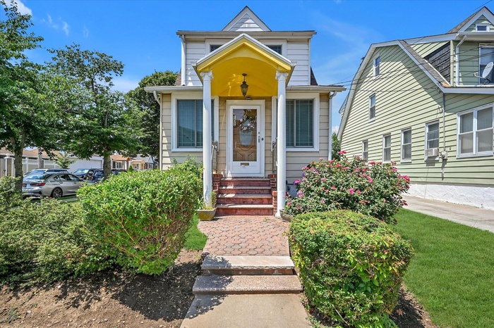 View of front of house with entry steps