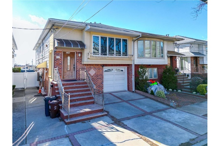 View of front of home with a garage
