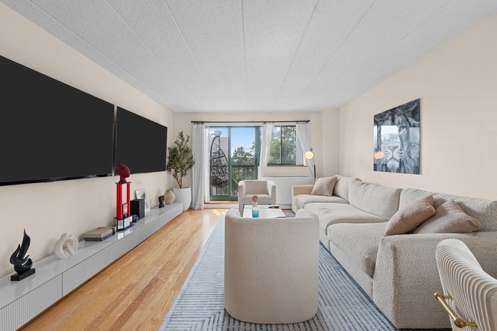 Living area with wood finished floors
