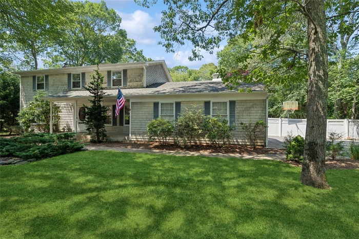 Traditional home featuring a chimney
