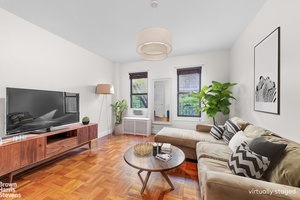 Welcome to this spacious three bedroom apartment located on a charming tree lined street in a stunning prewar building.