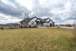 Custom Bungalow on 21. 14 Acres with Workshop, Pond amp ; Luxury Finishes.