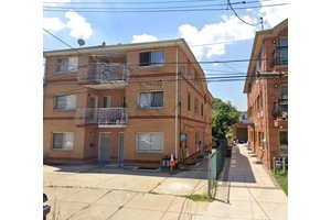 Welcome to this unique all brick two family home in the heart of bayside !