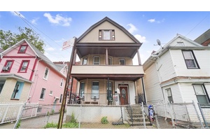 Legal 3 family House in the heart of Jamaica, featuring 12 Bedrooms, 6 full Bathroom, full finished Basement with Separate Entrance, huge pvt driveway and a garage.
