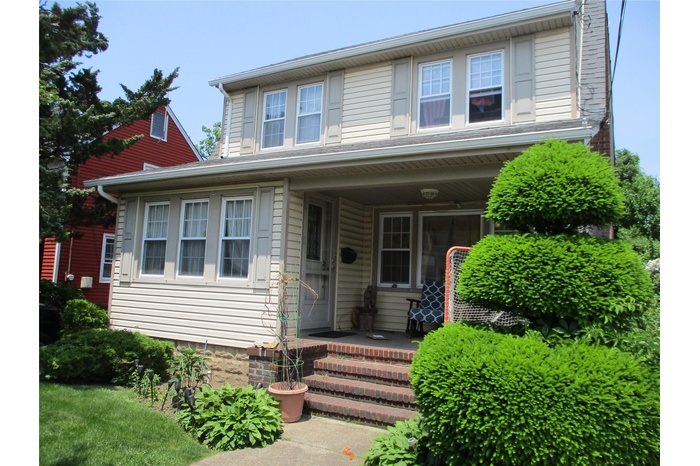 View of front of property with covered porch