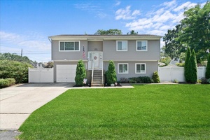 Beautiful, Well Maintained Hi Ranch on Quiet Corner Lot Move In Ready !