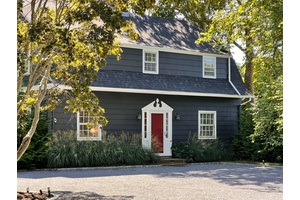 Nestled on a private road in the charming hamlet of Quiogue, this one of a kind, fully furnished, turn key residence features 4 bedrooms, 3 baths, a heated gunite saltwater ...