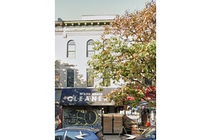 Mixed use brick building located at 1406 Nostrand Avenue, Brooklyn, NY 11226.