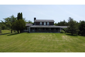 Nestled on 23 breathtaking acres, this charming 2 bedroom, 1.