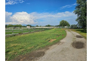 26 plus acres with farm house with private entrance.