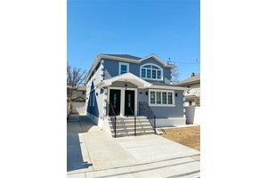 Huge Beautifully Redone Two Family Detached Hi Ranch, Located In A Quiet Neighborhood.