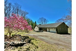 Set on an expansive 26. 14 acre SUB DIVIDABLE FOR ADDITIONAL INCOME parcel with breathtaking views of the Skinner's Falls Bridge and surrounding mountains, this charming stone faced ranch offers ...