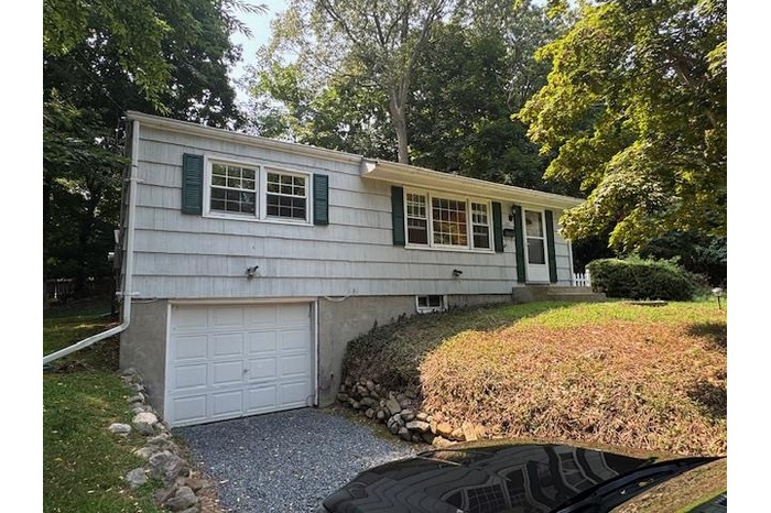 Single story home featuring an attached garage