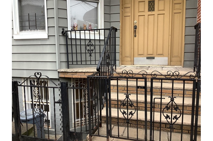 View of exterior entry featuring a gate