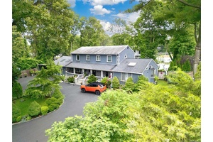 Welcome to your new resort style home located in the heart of Syosset, Long Island.