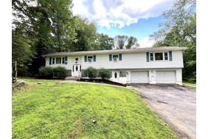 Welcome to this spacious and versatile detached multi family home nestled in the charming town of Hyde Park, just minutes from the world renowned Culinary Institute of America, Marist University, ...