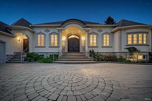 Exceptional opportunity to own a beautifully maintained bungalow nestled on a huge lot in one of the areas most prestigious and sought after communities, surrounded by luxurious multi million dollar ...