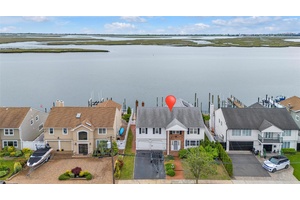 HUGE PRICE IMPROVEMENT ! This your opportunity own waterfront property on one of Oceanside's most sought after streets.
