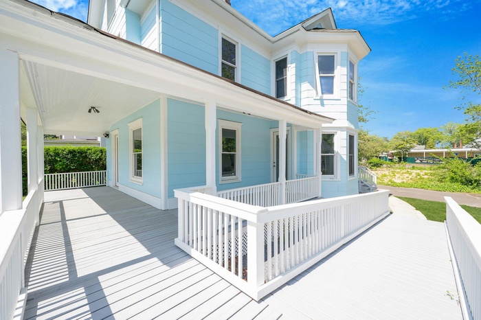 View of wooden porch and ADA ramp