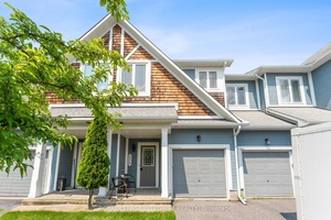 Stunning FREEHOLD NO COMMON FEES Townhome Backing onto Pond amp ; Trails !