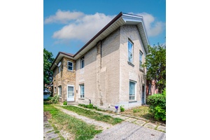 This large home is in significant need of renovation and sold in as is condition.