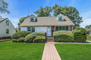 Pack your bags ! Welcome to 299 Warren Street in Uniondale.